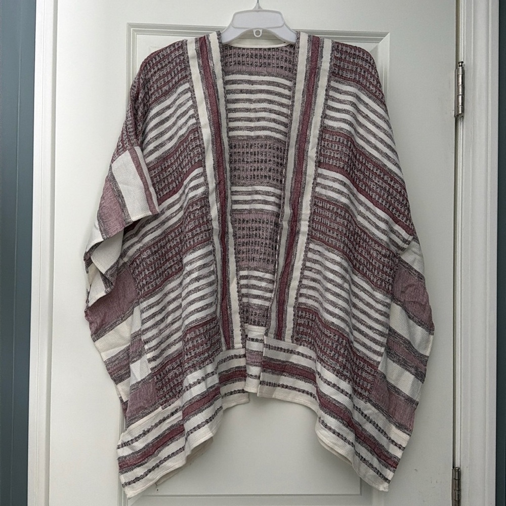 Open poncho with arm holes